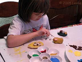 painting the salt dough cavies